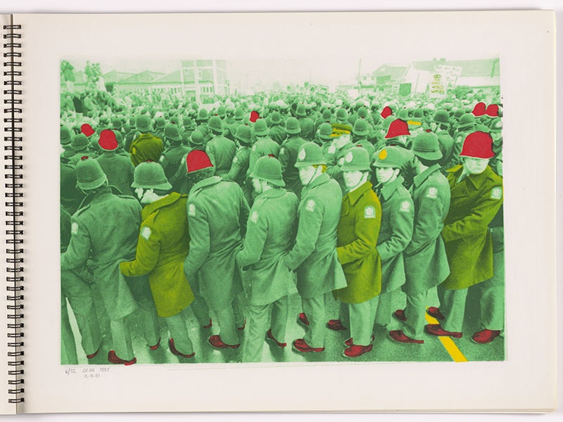 Screenprint of a photograph of a group of policemen. It has been coloured green and some of the police hats and shoes have been coloured red