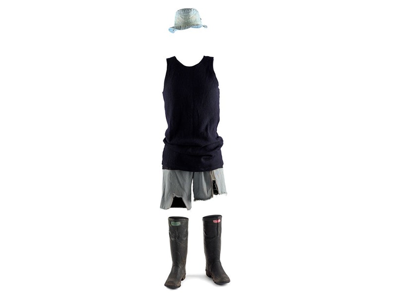 Gumboots, shorts, a singlet and a hat set up like there is a person wearing them on a white background
