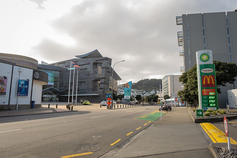Wide shot of the entrance to Te Papa from Cable St showing the road you enter to drive into the carpark