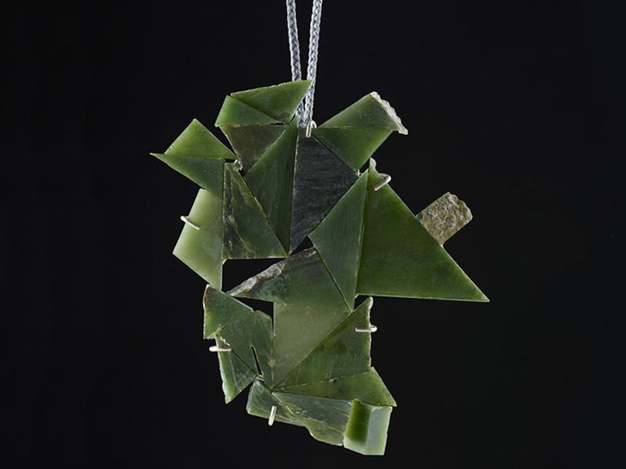 Lisa Walker, Pendant, 2015, pounamu shards, silver wire, thread. Purchased 2015. Te Papa (2015-0046-1) =""