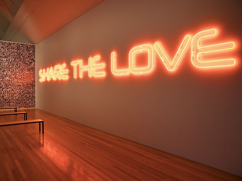 Janet Lilo, Top16 (installation view), 2007–18, neon sculpture, benches, whiteboard wall, selfie wall graphic, video. Photograph by Maarten Holl. Te Papa art-renew-holl-116-800.jpg