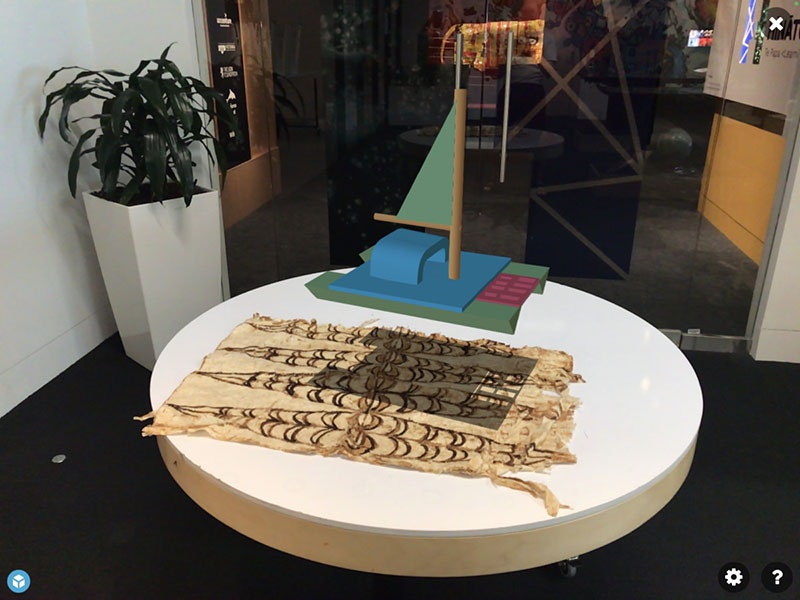 Digital vaka (canoe) displayed on top of a table via a screen