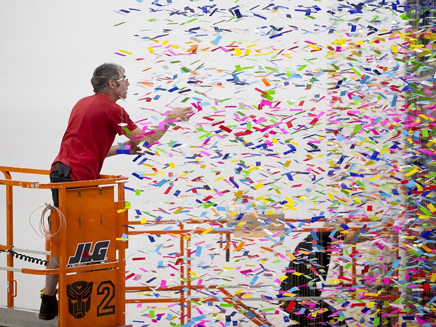 savvas-install-07-1000.jpg An man stands on a scissor lift installing Finale: Bouquet