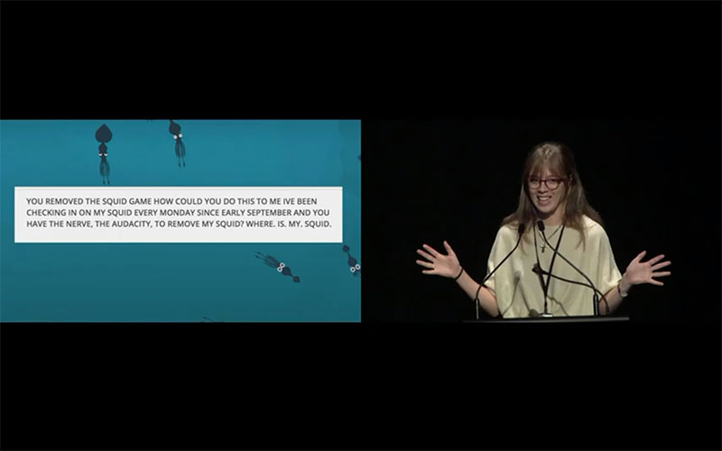 Screenshot of video of woman presenting at a conference