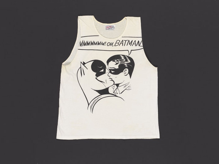 ‘MMMMMMM! Oh, Batman...’ singlet, early 1980s, China, by Swan Brand. Gift of Michael Eyes, 1995. Te Papa (PC004264) White singlet with a black and white illustration of Batman and Robin kissing