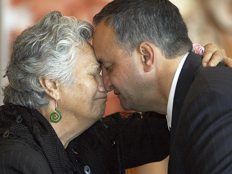 Pōwhiri for the repatriation of kōiwi tangata, 2005. Te Papa (65503) A man and a woman pressing noses