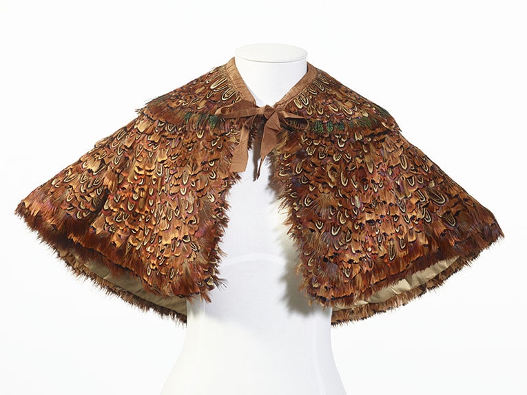 Feather pelerine, United Kingdom, maker unknown. CC BY-NC-ND 4.0. Te Papa (GH016753) A hand-stitched feather pelerine with a detachable collar, using pheasant feathers