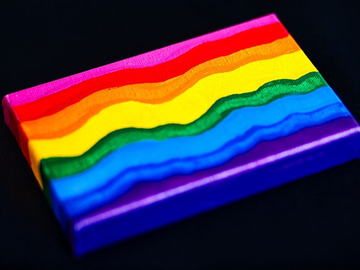 Gilbert Baker, Rainbow Flag, 2012. Photo by and courtesy of Gareth Watkins A painting of a rainbow on a small canvas