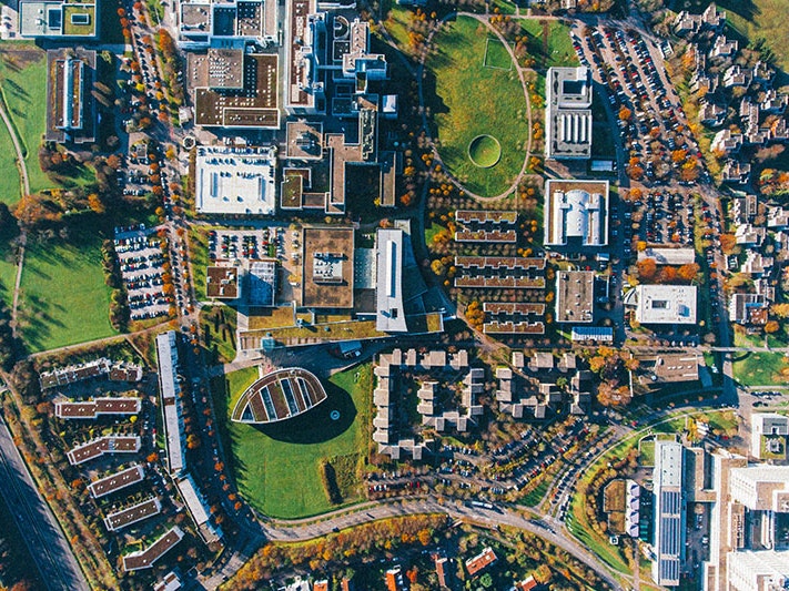 Aerial view of a town. Photo by Max Böttinger via Unsplash Aerial view of a town