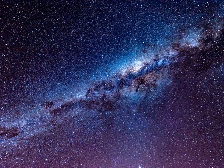 The Milky Way from Takapō, 2018. Photo by Graham Holtshausen / Unsplash View of the Milky Way