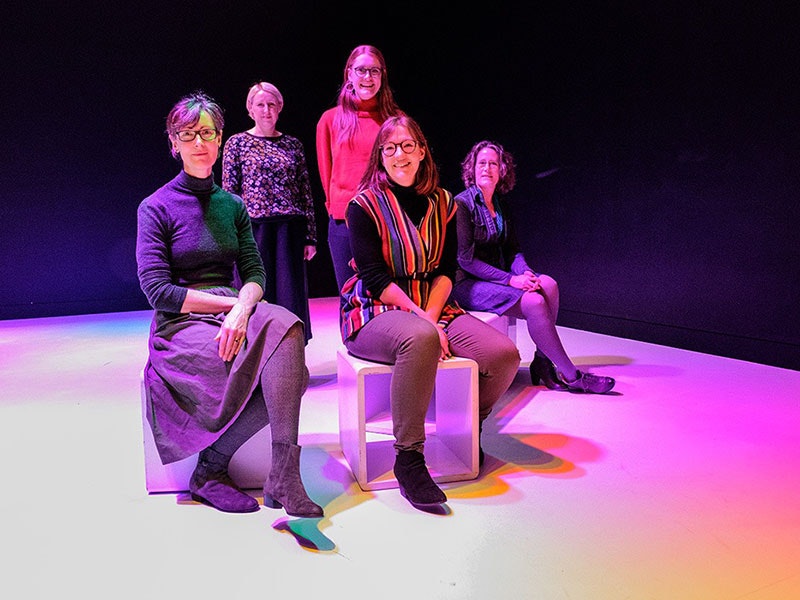 The Kates in Tiffany Singh’s Total internal reflection. Standing (L-R): Kate Button and Kate Wanless. Sitting (L-R): Kate Whitley, Katie Cooper, and Kate Camp. Photo by Daniel Crichton-Rouse. Te Papa =""