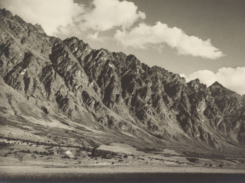Remarkables, circa 1940s, Queenstown, by H. Farmer McDonald. Gift of the Fastier family in memory of Gillian Fastier, 2013. Te Papa (O.043716) Black and white photo of craggy mountain tops