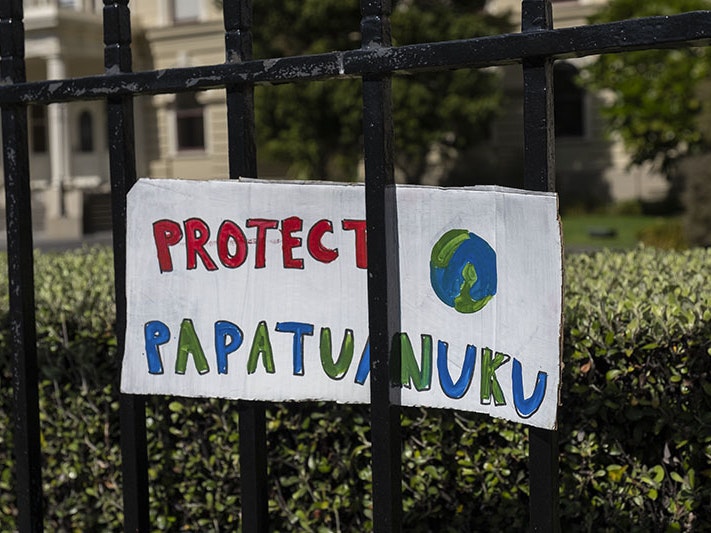 Wellington climate strike, 27 September 2019. Photo by Rachael Hockridge. Te Papa (145560) A sign on a fence with a picture of the Earth and the message "Protect Papatuanuku"