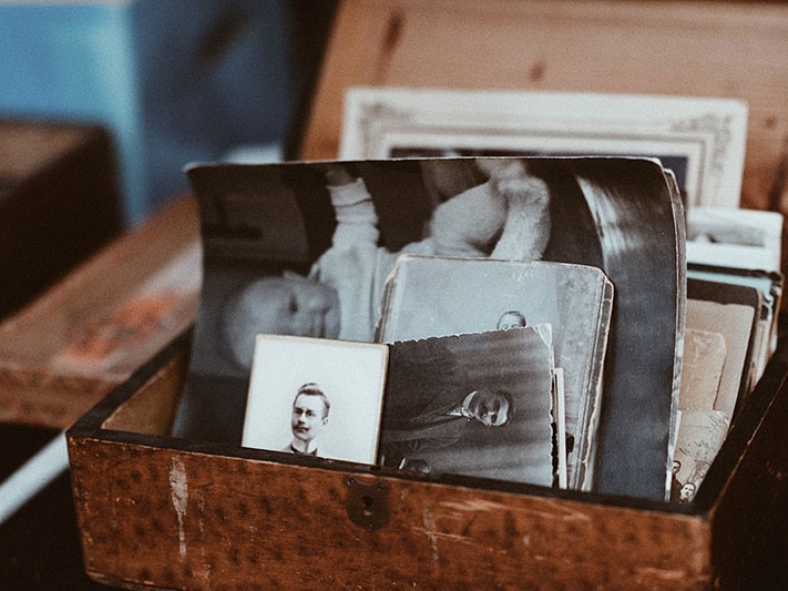 Wooden box of photos, 2016. Photo by Roman Kraft / Unsplash Small wooden box containing a collection of old black and white portraits
