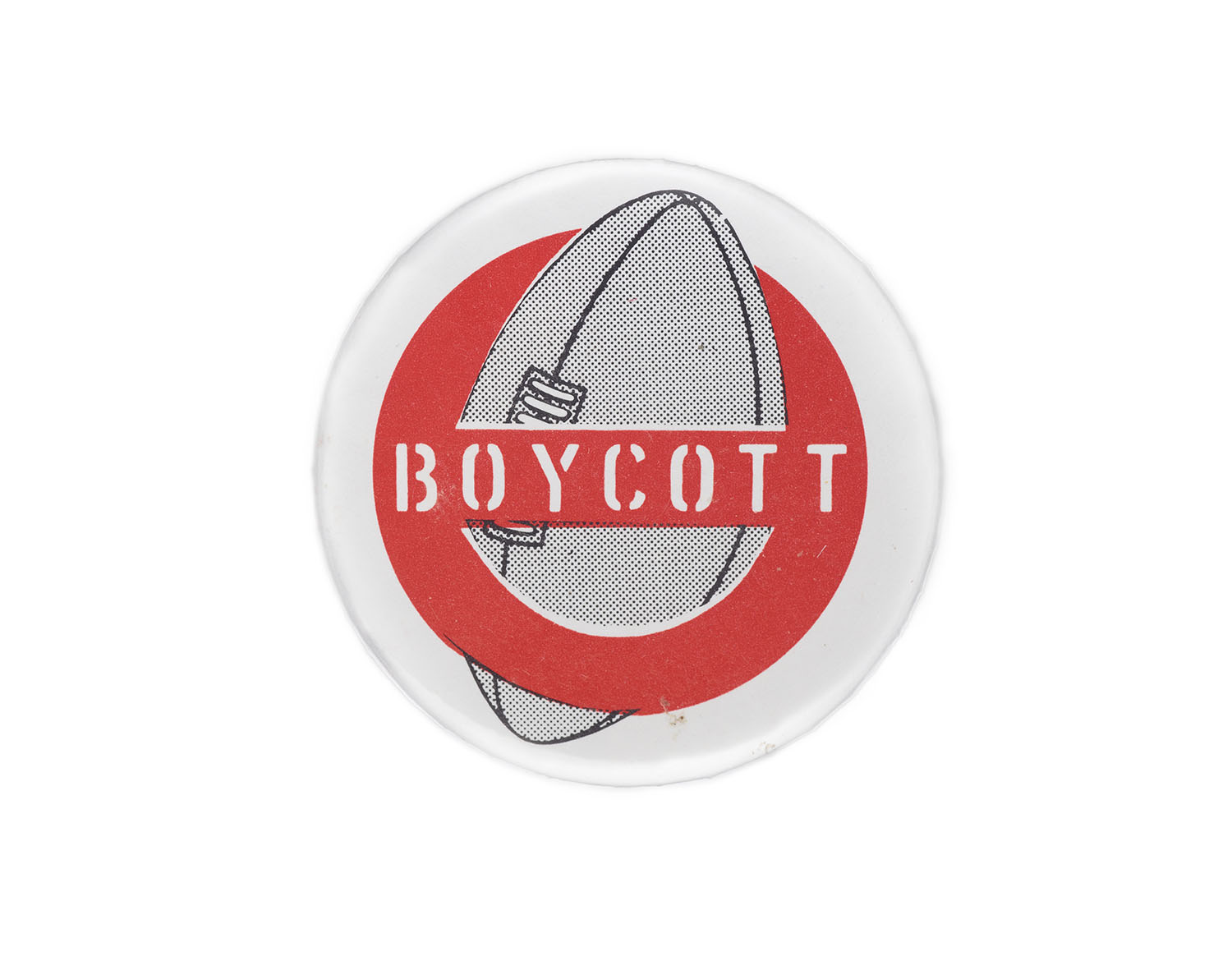 White badge with a rugby ball on it and a red strike-through across the ball and the word “Boycott”