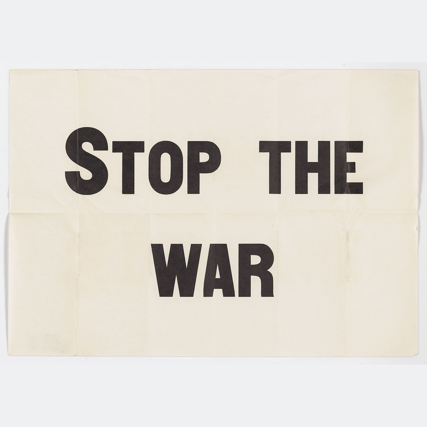 White paper with the words “Stop The War” printed on it