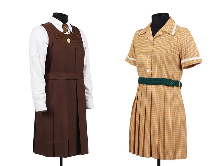 Girl's school tunic, mid 1950s, New Zealand, by Wellington Woollen Manufacturing Company. Gift of Wellington High School, 2009. CC BY-NC-ND 4.0. Te Papa (GH016880) and Queen Victoria Maori Boarding School girl's Sunday Best uniform, George Courts & Sons L Two girls school uniforms on dressmaker dummies