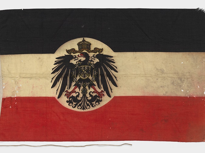 Ensign (German Foreign Office State Flag, 1892-1919), 1914-1918, Germany, by J.E.W. Hellgardt. Gift of Dr Alex M Rutherford, 1954. CC BY-NC-ND 4.0. Te Papa (FE002793) Black-White-Red tricolour, with a white disc in the centre on which is an Imperial Eagle with the Imperial Crown.