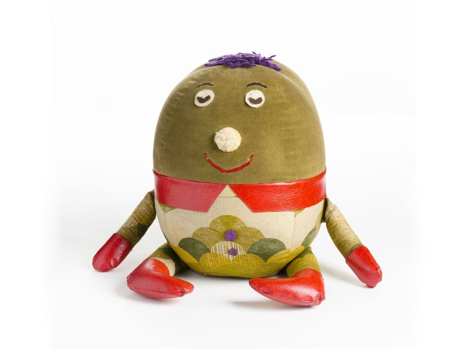 Humpty Unknown; maker/artist; 1968; New Zealand. Gift of Whitebait TV Productions, 2004. Te Papa (GH014510) A stuffed round green egg-shaped toy wearing trousers.