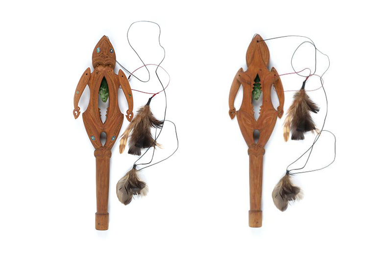 Two views of a wooden marionette that has a cord coming off it which has feathers attached.