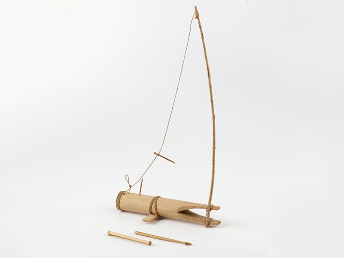 Kai ni Kabaru (Mouse trap), about 1980s; Kiribati. Te Papa (Gift of Wendy Smith, 2010) A short piece of bamboo tube with a long stick protruding from one end that is tied with cord.