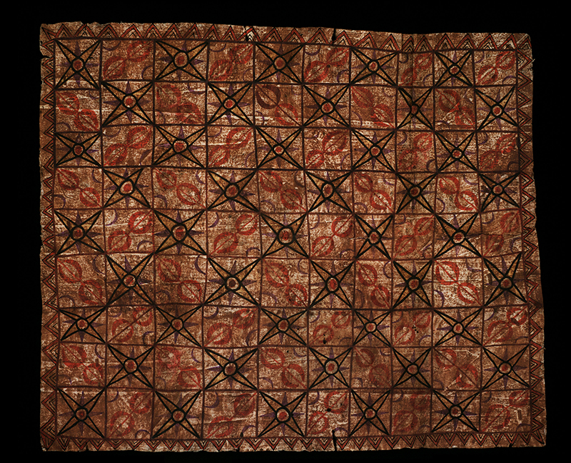 Tapa cloth with repeating patterns in red and black.