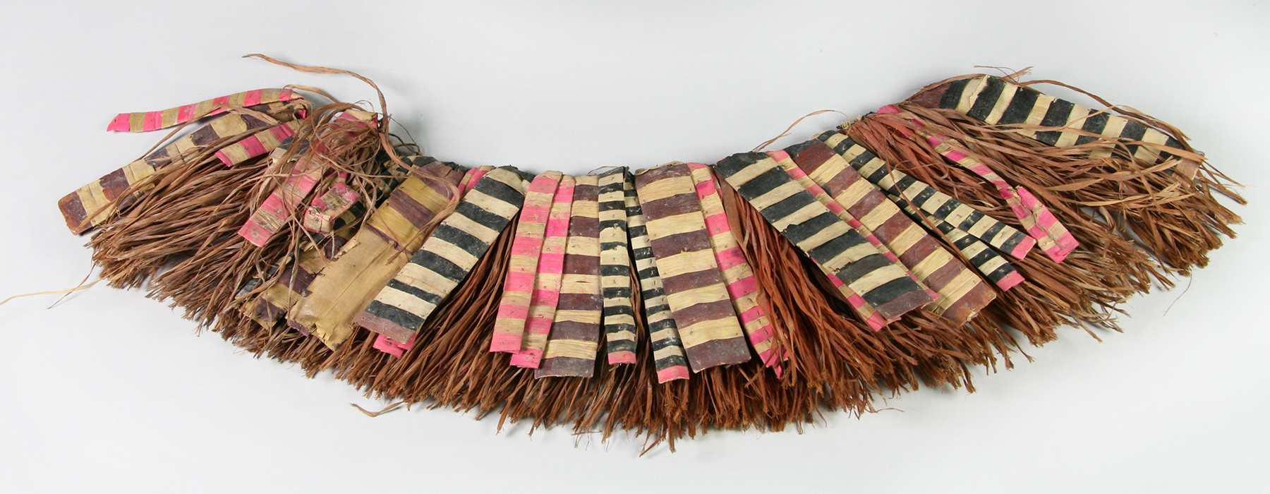 A skirt made of strips of painted Hibiscus fibre; and pandanus