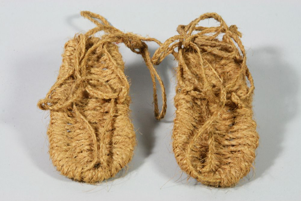 A pair of sandals woven from coir.