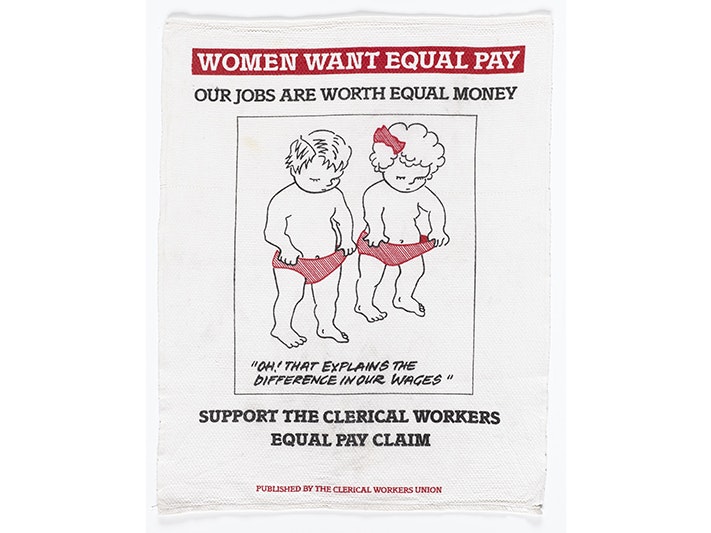 Women Want Equal Pay teatowel, New Zealand Clerical Workers' Union; publisher; 1985; New Zealand. Gift of Jan Noonan, 2010. Te Papa (GH016924) A teatowel showing two small children holding their pants open and looking down. The main message is "Oh! That explains the difference in our wages"