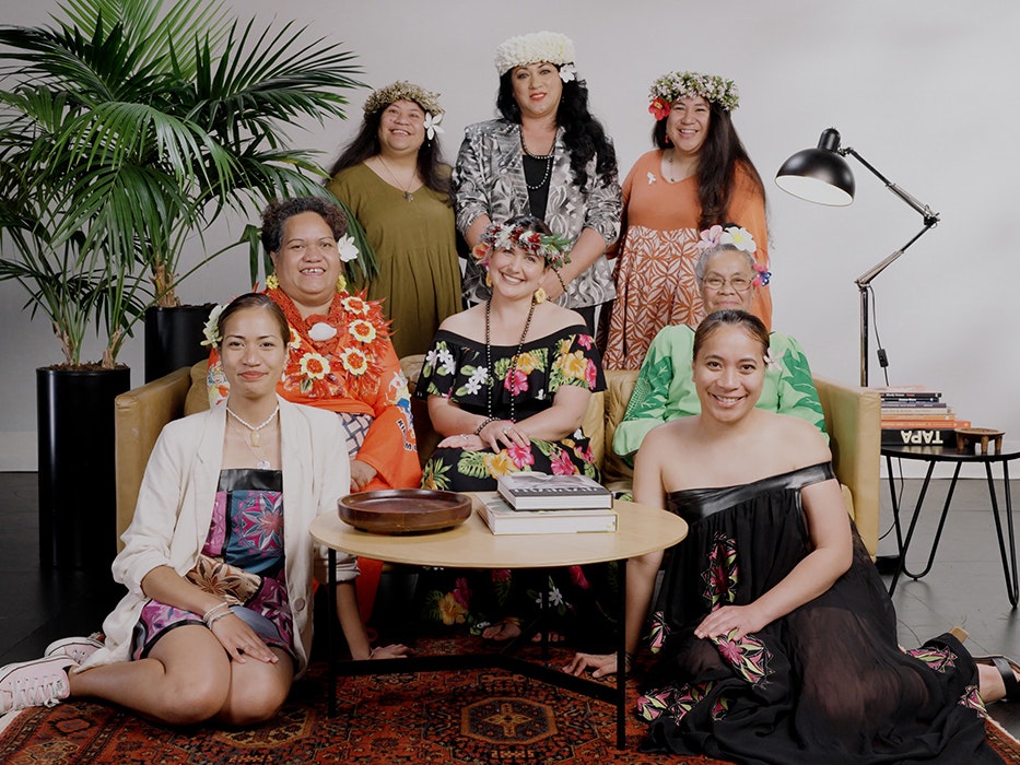We are not your dusky maidens! women. Te Papa Eight women arranged around a sofa on a stage and smiling at the camera.