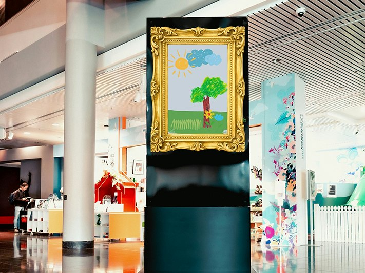 Colouring competition: get your art displayed at Te Papa, 2026. Photo by Beeline Creative A photo of a framed child's painting in a large foyer space.